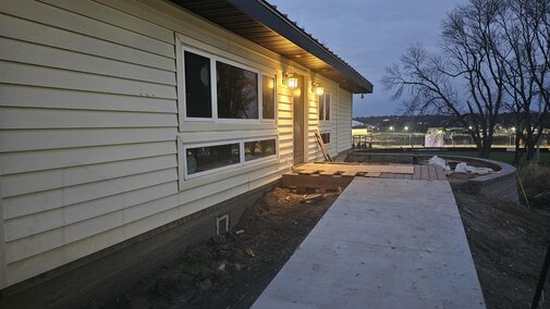 Night view of front patio in-progress Nov 24, 2024